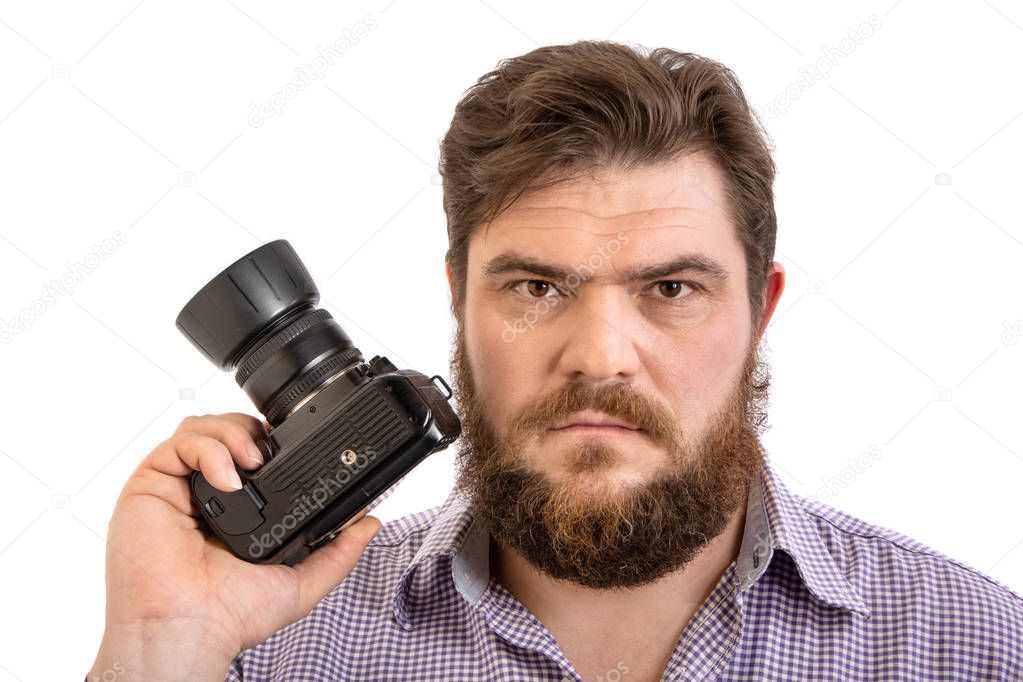 portrait of big handsome bearded photographer posing with professional DSLR camera, isolated on white