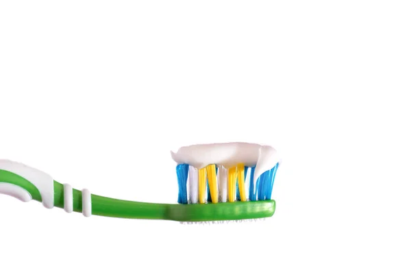 Toothbrush squeezed on toothbrush toothpaste white background — Stock Photo, Image