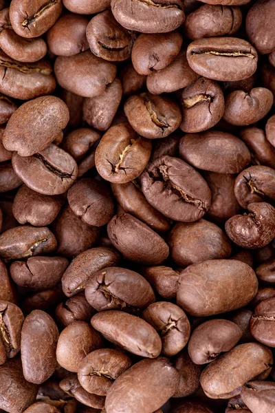 Närbild textur patern bruna kaffebönor isolerade på vitt — Stockfoto