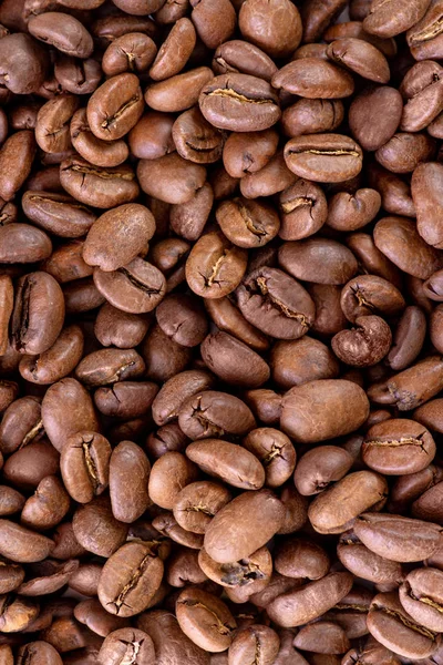 Close up textura patern grãos de café marrom isolado em branco — Fotografia de Stock