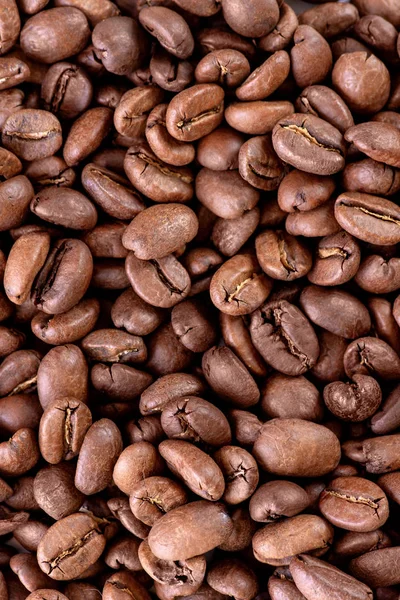 Close up textura patern grãos de café marrom isolado em branco — Fotografia de Stock