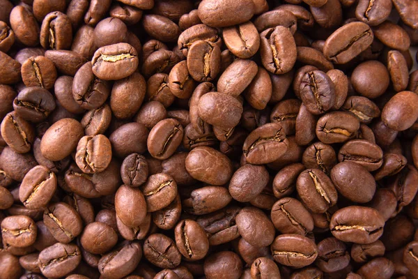 Närbild textur patern kaffebönor isolerade på vitt — Stockfoto