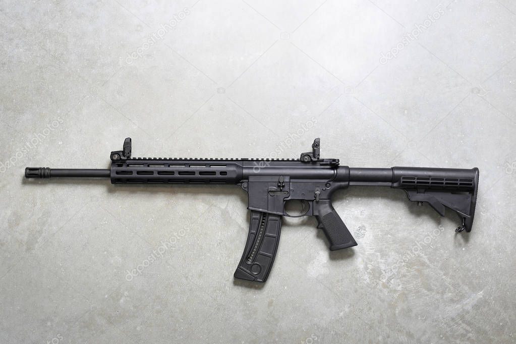 Assault rifle. Rifle on a gray background.