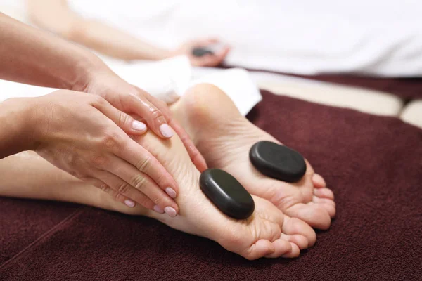 Female Feet Basalt Stones Relaxing Spa Salon — Stock Photo, Image