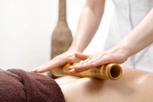 Massage Bamboo Sticks Masseur Massages Body Using Bamboo Sticks — Stock Photo, Image