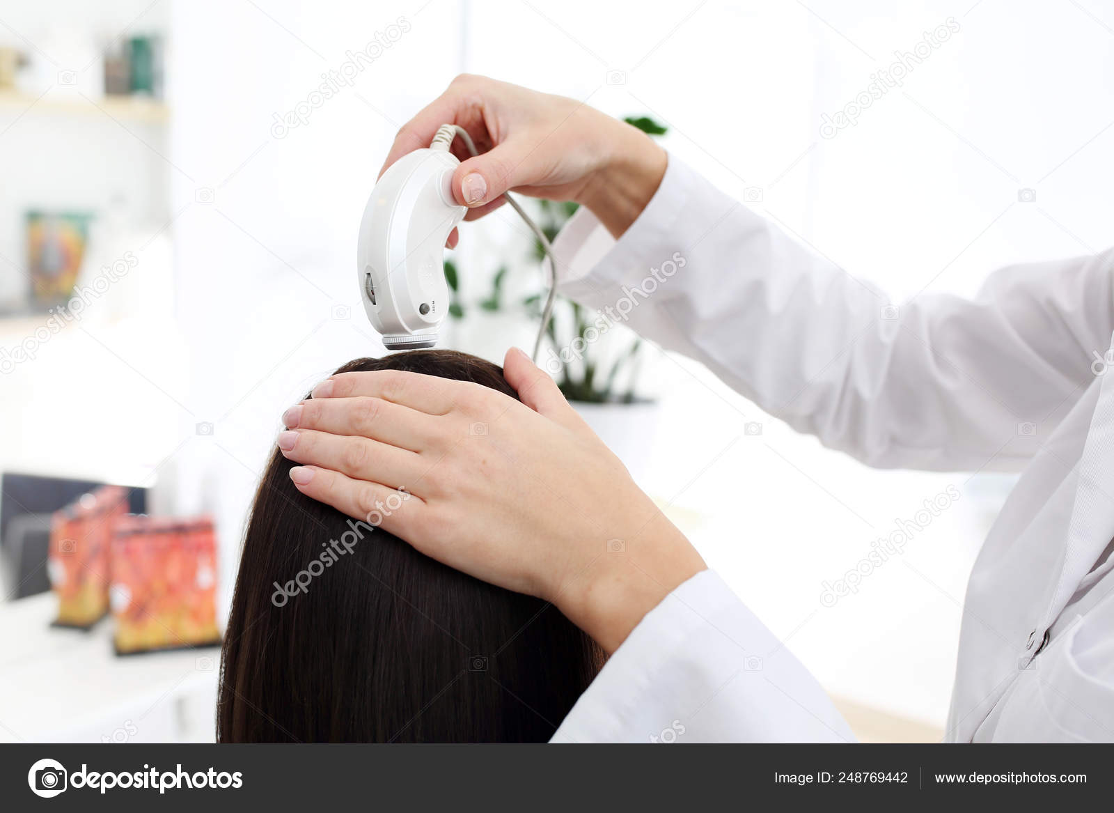 Professional Hair Scalp Examination Using Microcamera Stock Photo by