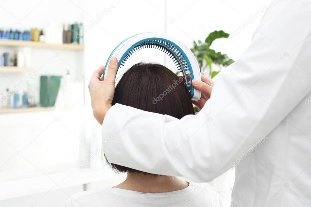 Laser therapy for scalp and hair.