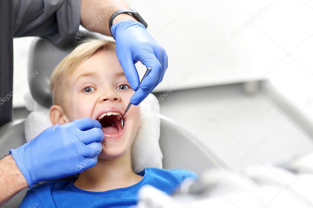 Child at the dentist. Dental review