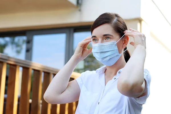 Virus Protection Woman Puts Protective Mask Prevention Protection Infection Healthcare — Stock Photo, Image