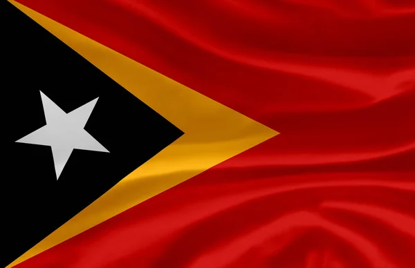 Osttimor schwenkt Flagge. — Stockfoto