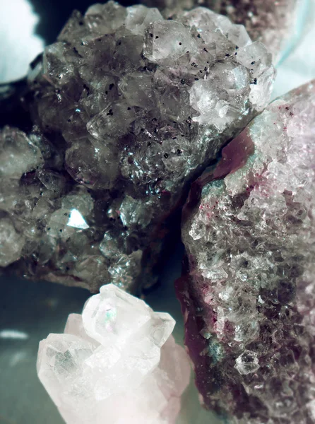 Gemstone Quartz closeup as a part of cluster geode filled with rock crystals.