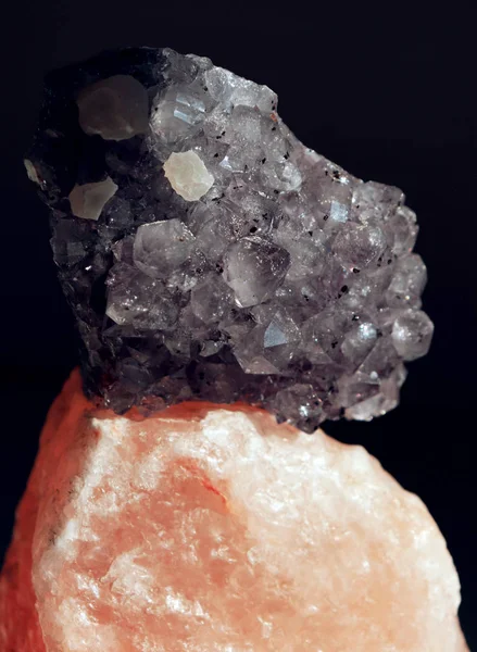 Gemstone Quartz and salt closeup as a part of cluster geode filled with rock crystals.