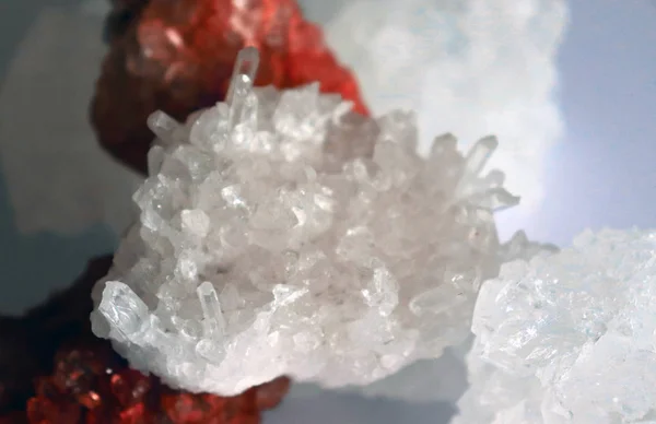 Gemstone Quartz closeup as a part of cluster geode filled with rock crystals.