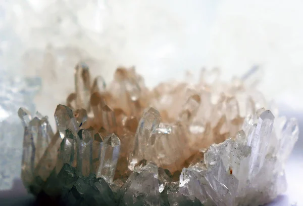 Gemstone Quartz closeup as a part of cluster geode filled with rock crystals.