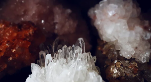 Gemstone closeup composition as a part of a cluster filled with rock crystals.