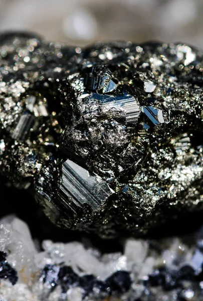 Pyrite mineral also known as fools gold with glossy and metallic geometric crystal stucture. Gemstone with silver shine.