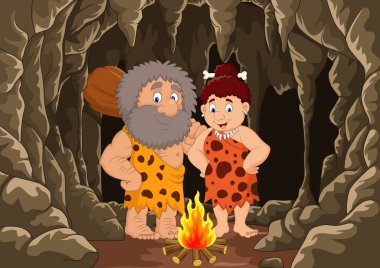 Cartoon prehistoric caveman couple with cave background clipart