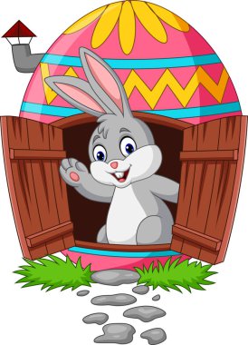 Vektör çizim karikatür bunny ile dekore edilmiş Paskalya yumurta evi