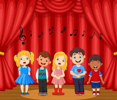 Sahnede şarkı söyleyen çocukların temsilcisi.