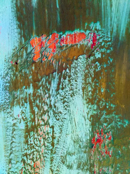 Eski boyalı metal yüzeye katmanlı yeşil ve parlak turuncu renk ile