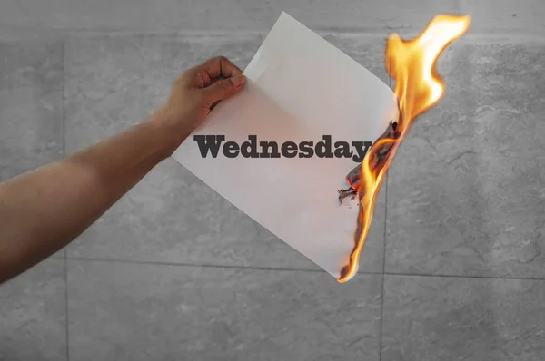 Wednsday word text on fire with burning paper — Stock Photo, Image