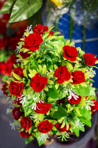 Red flower bouquets and these are artificial — Stock Photo, Image