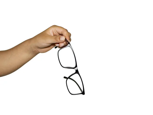 Brille wird von Fingern und Hand auf weiß gehalten — Stockfoto