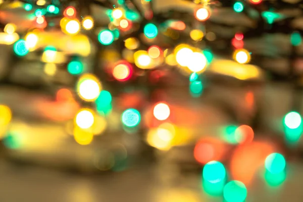 Yeni yıl odak parlayan bulanık boken ışıklar kırmızı güzel parlak Noel dekorasyonu arka plan