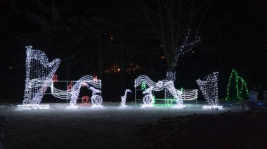 Müzik aletleri ve notlar parlayan Noel Işık dekorasyon