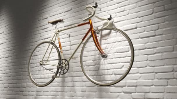 Camera Panning Vintage Bicycle Hanged White Brick Wall — Stock Video