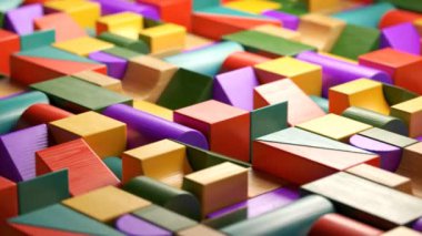Renkli ahşap bloklar oyuncaklar sonsuz desen koyulur. Kamerayı kapatın. İlmekledi animasyon.