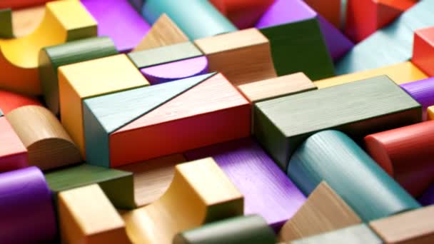 Blocs Bois Colorés Jouets Posés Dans Motif Sans Fin Caméra — Video