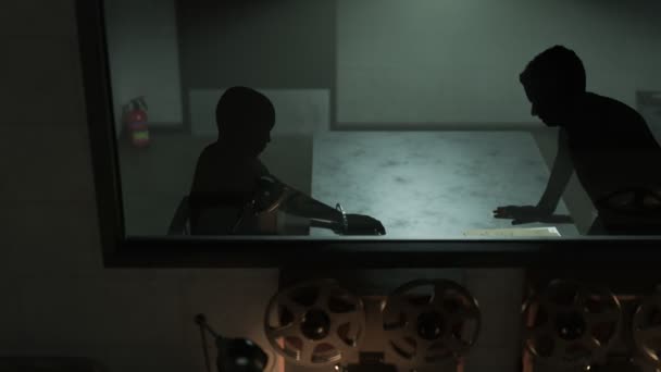 Interrogation Room Behind One Way Mirror Glass Reel To Reel Recording Interview With A Handcuffed Man Camera Moves From Left To Right