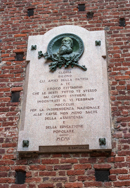 Milan, Italy - May 29, 2018: A plaque to commemorate Giuseppe Piolti de Bianchi at Sforza Castle. Giuseppe Piolti de Bianchi is an Italian revolutionary.