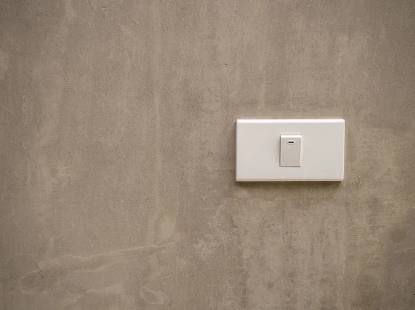 Beyaz Çimento duvara açma/kapama ışığı düğmesi için geçiş