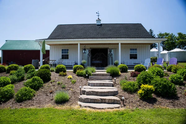 Front walkway of a cute rural farmhouse in upstate new york