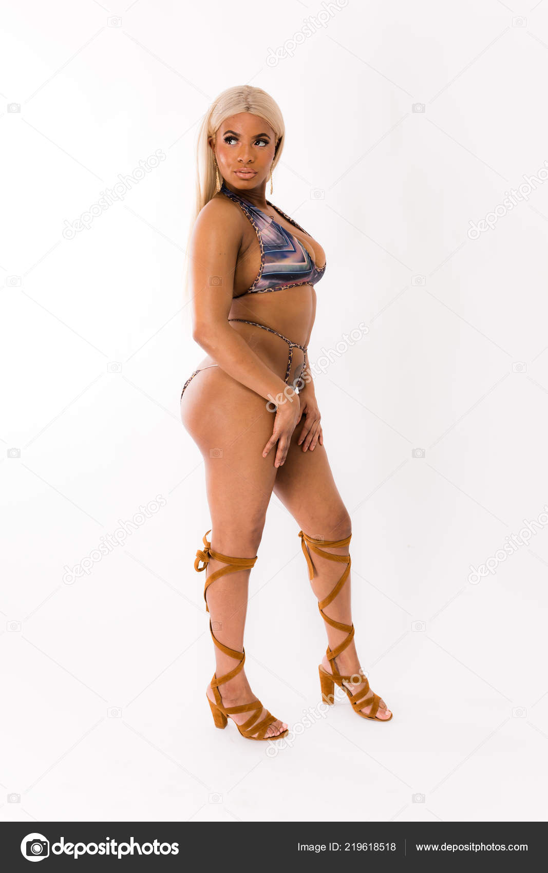 Fit Young Mixed Race Woman Long Blonde Hair Poses Striped Stock