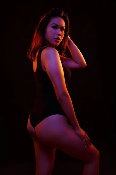 Fit Young Asian Woman Black One Piece Poses Black Orange — Stock Photo, Image