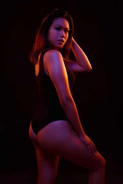 Fit Young Asian Woman Black One Piece Poses Black Orange — Stock Photo, Image