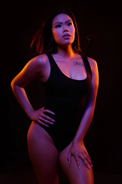 Fit Young Asian Woman Black One Piece Poses Black Orange — Stock Photo, Image