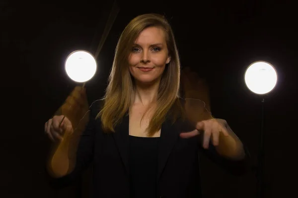 Young Caucasian Woman Conductor Poses Baton Dark Space Stage Lights — Stock Photo, Image