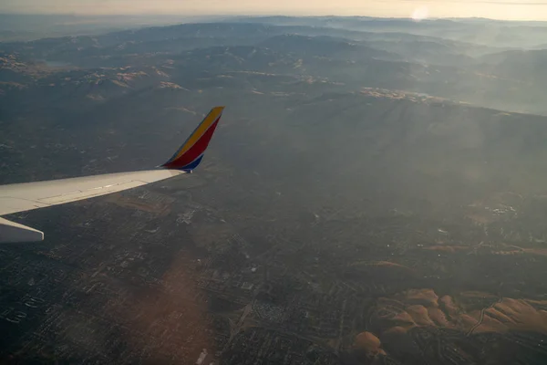 Aerial view of East Bay Area, California at sunrise shot from an airliner