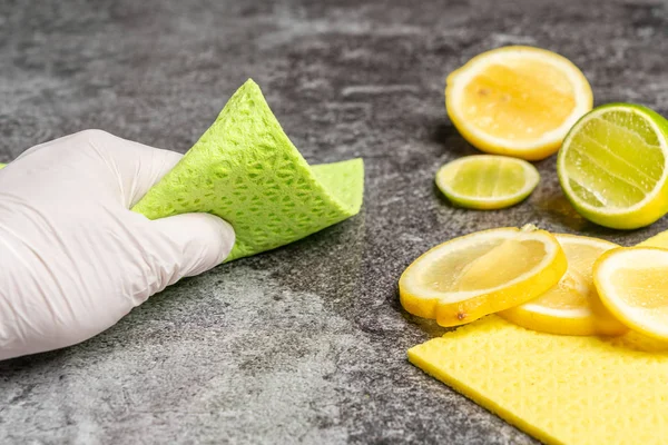 cleaning the table with lemon biological cleaning agents