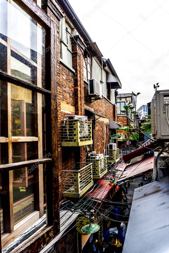 Old Shanghai Tianzifang District Open Window Building with Cloudy Rainy Sky Background