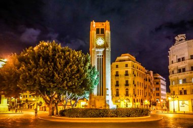 Beirut Place De L'Etoile Nijmeh Square Street Clock Tower at Night clipart