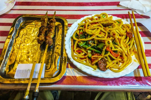 Uyghur Traditional Hot Spicy Lamb Skewers Cumin Lagman Noodles Dish — Stock Photo, Image