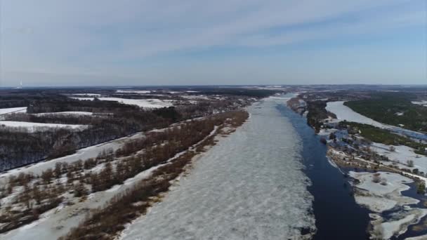 Quadcopter Shooting Early Spring River — Stock Video