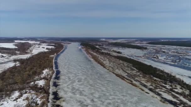 Quadcopter Shooting Early Spring River — Stock Video