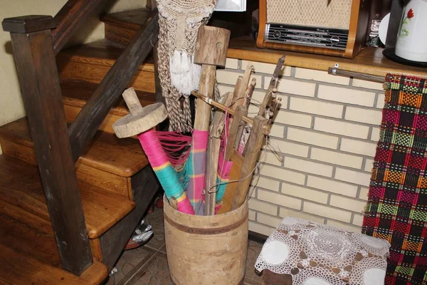 Still-life with old things on brown wooden background