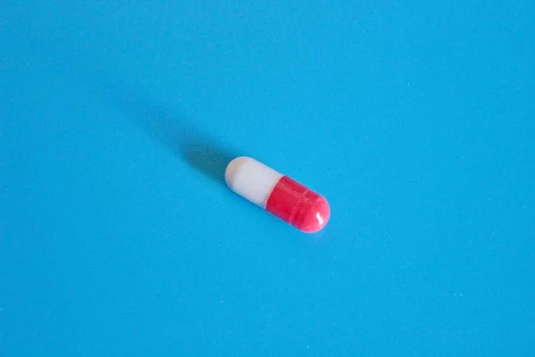 Pharmacology pills on blue background — Stock Photo, Image